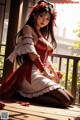 A woman in a red and white dress sitting on a porch.