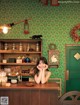 A woman sitting at a counter in a restaurant.